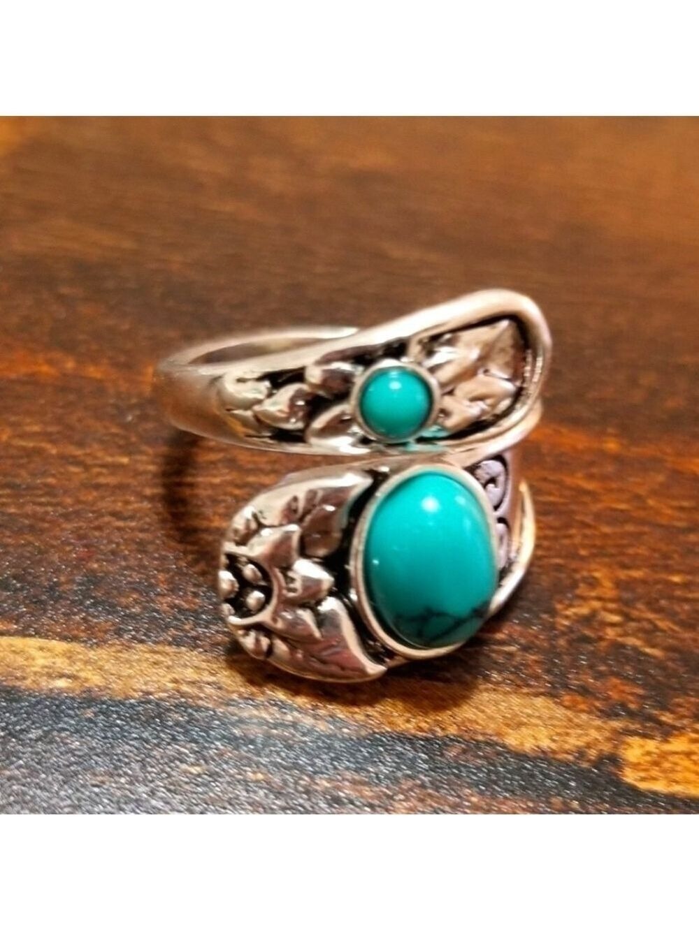 Great looking Victorian  style ring size 7 silver tone with synthetic turquoise.